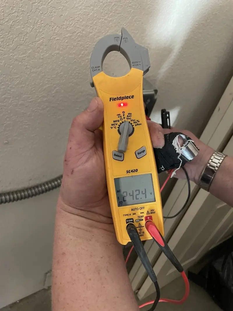 Voltage testing with clamp meter during Hot Tub / Pool Electrical Wiring in Oakridge